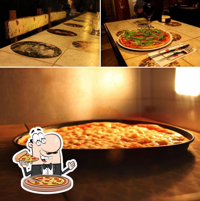 Essayez des pizzas à Restaurant Hotel Tenne
