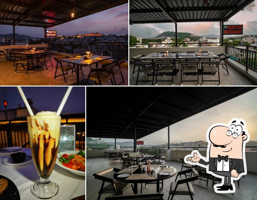The interior of TMV Rooftop Restaurant Pure Veg