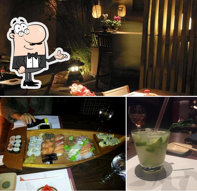 A imagem da interior e bebida no Sakura Restaurante
