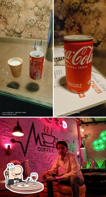 The image of Black Lounge and Cafe’s food and bar counter