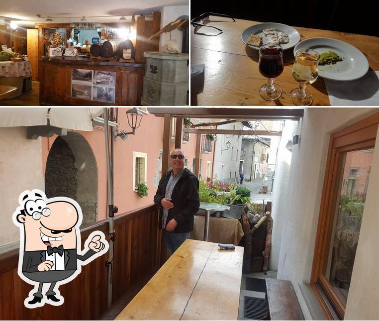 Questa è la foto che raffigura la interni e vino di Ristoro du Centre