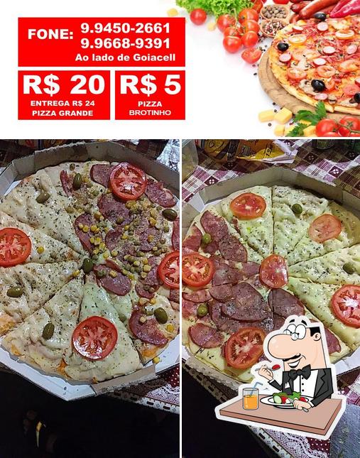 Comida em Pizzaria Top Pizzas