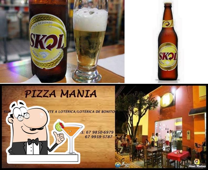 A ilustração do Pizza Mania Bonito-MS’s bebida e interior