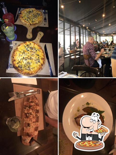 Try out pizza at Muza Restaurante