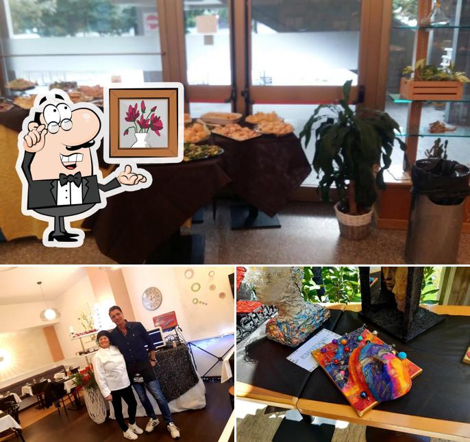 La foto di interni e tavolo da pranzo da Mamy Caffè