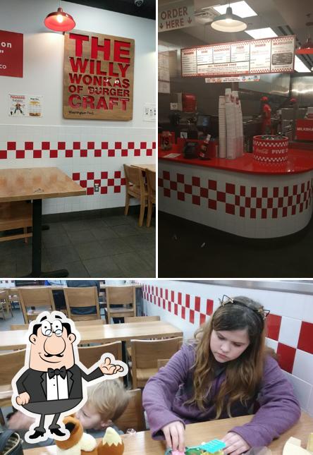 Take a seat at one of the tables at Five Guys