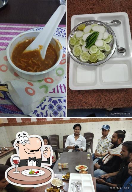 Check out the picture showing food and interior at New Bajrang Family Restaurant