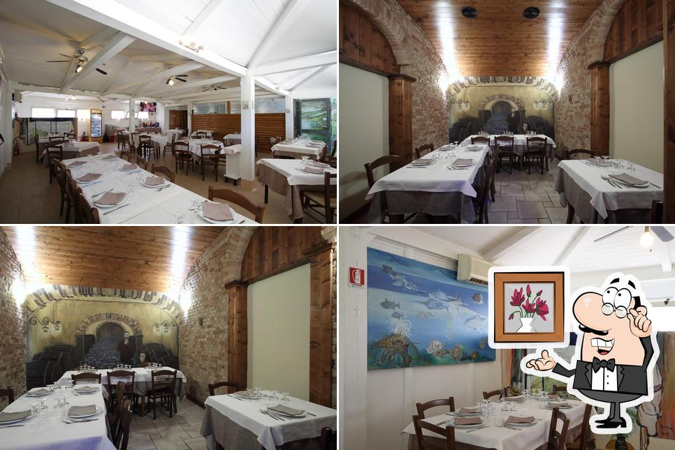 El interior de Osteria La Vecchia Stazione