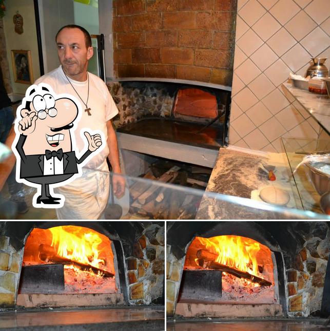 Dai un'occhiata agli interni di Pizzeria d'asporto reginella