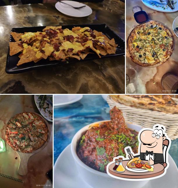 Pick pizza at Gilt Club