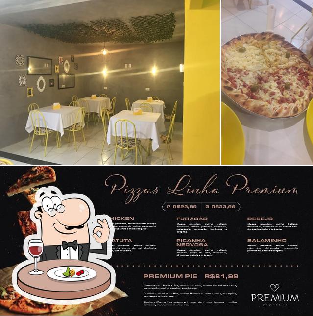 A foto a Premium Pizzaria’s comida e interior