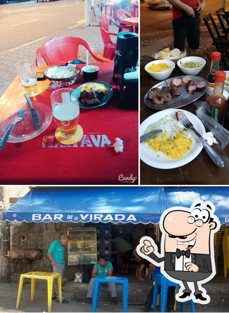 Sente em uma das mesas no Bar da Virada