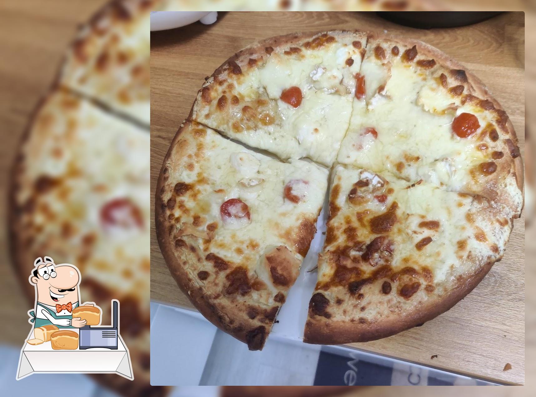Scopizza Briey "Distributeur de pizzas et Tiramisu" Maison
