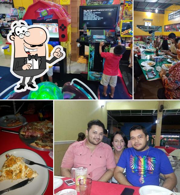 O interior do Pizzaria Guia do sabor Diversão