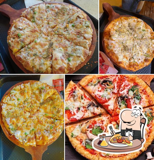 Get pizza at Rooster Cafe, Benta vip road Darbhanga