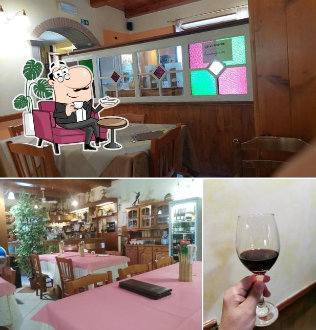 La immagine di interni e bevanda da Giuditta-ristorante-locanda