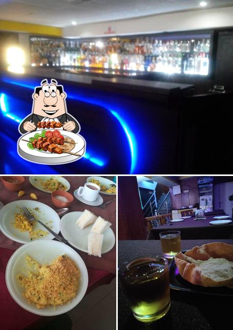 Take a look at the image showing food and bar counter at Hotel The Landmark