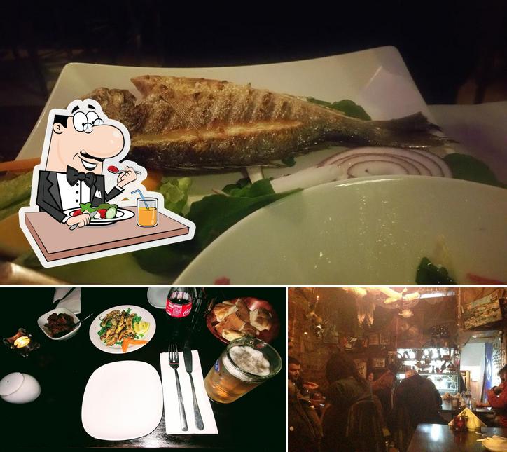 Это фотография, где изображены еда и барная стойка в Sariyer Balik London