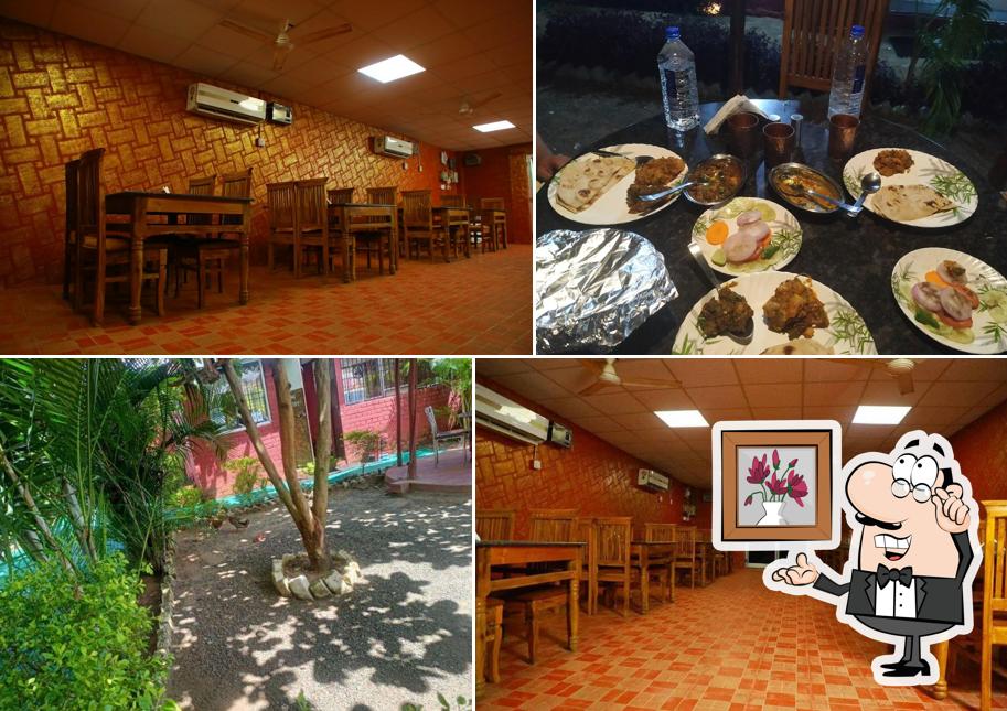 Take a seat at one of the tables at Jungle Junket Dhaba
