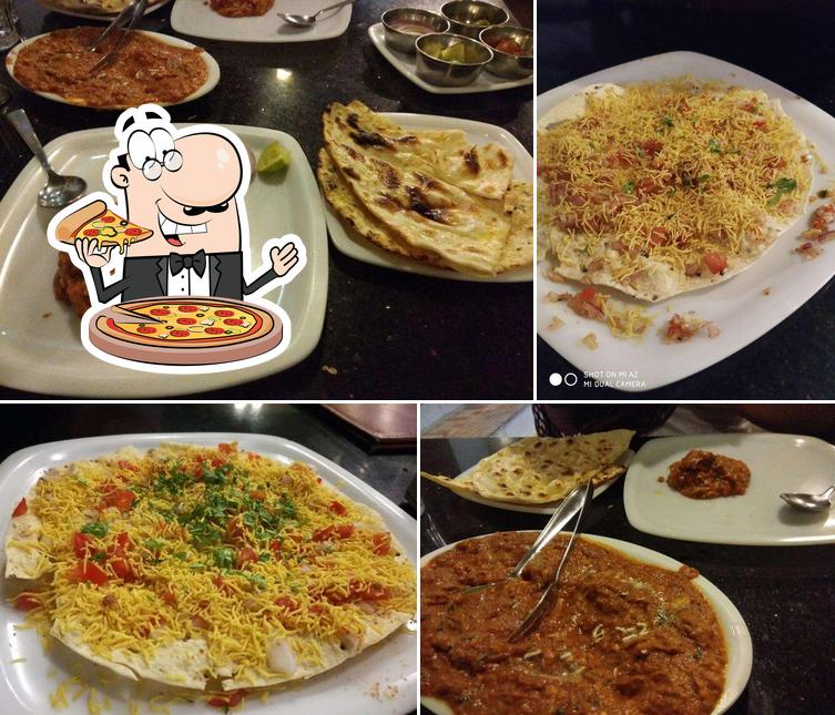 Try out pizza at The Maratha Veg Restaurant : Maharastrian Thali in Pimple Gurav : Jain Thali in Pimple Gurav : Veg Thali in Pimple Gurav