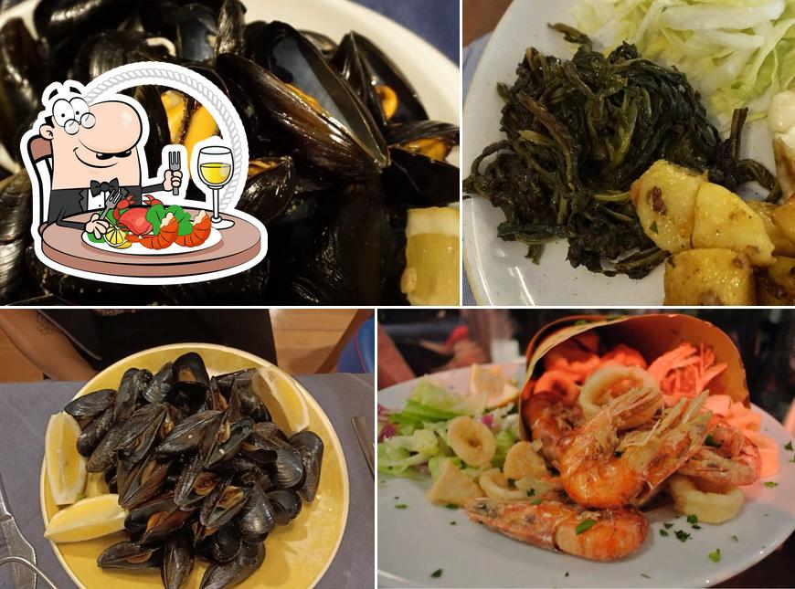 Scegli tra i molti pasti di mare offerti a Trattoria Da Adriano