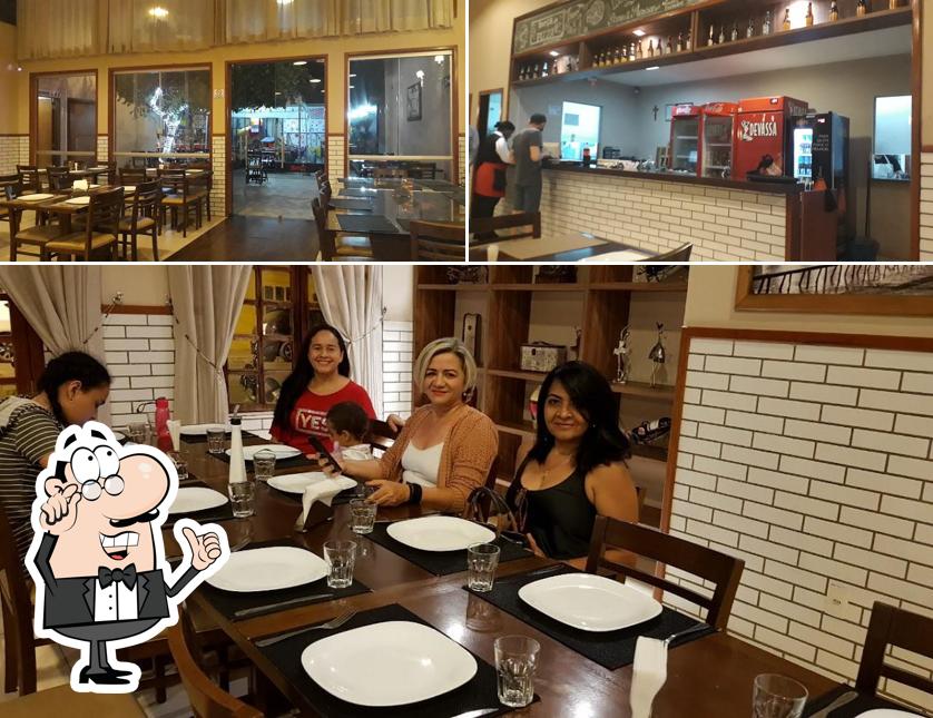 O interior do Forneria Gourmet - Pizzaria e Restaurante