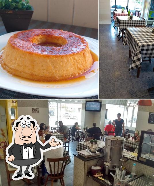 O Santo Prato Café & Refeições se destaca pelo interior e mesa de jantar