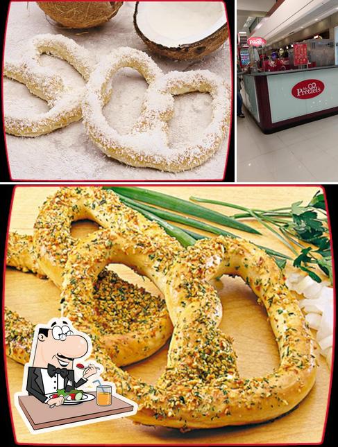 Confira a imagem apresentando comida e interior no MR.PRETZELS