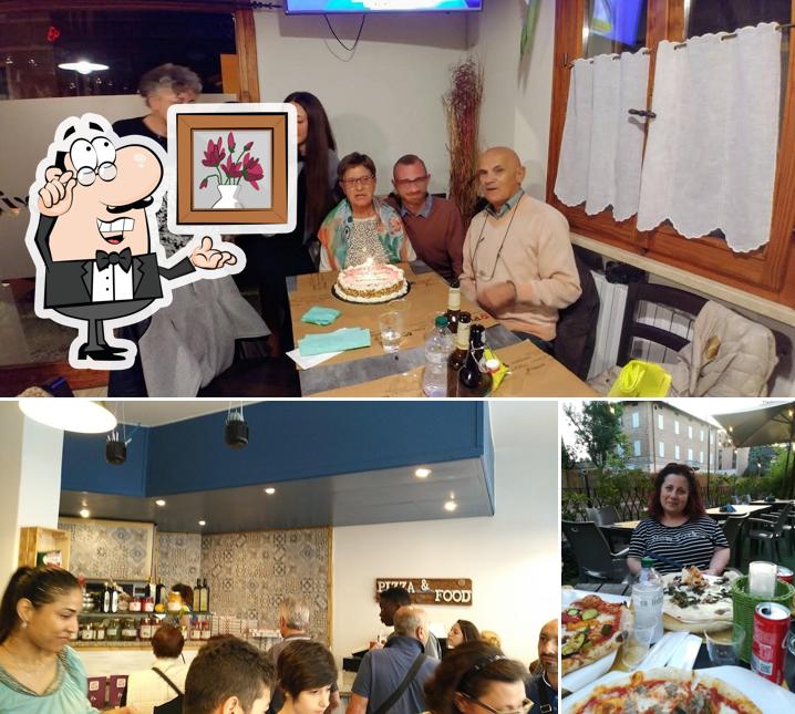 Siediti a un tavolo di Pizzeria e pucceria Desideria