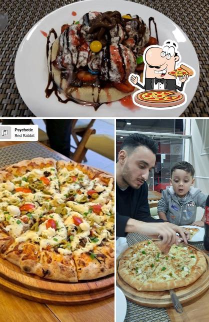 No Mami's Restaurante - Esfiharia e Pizzaria, você pode degustar pizza