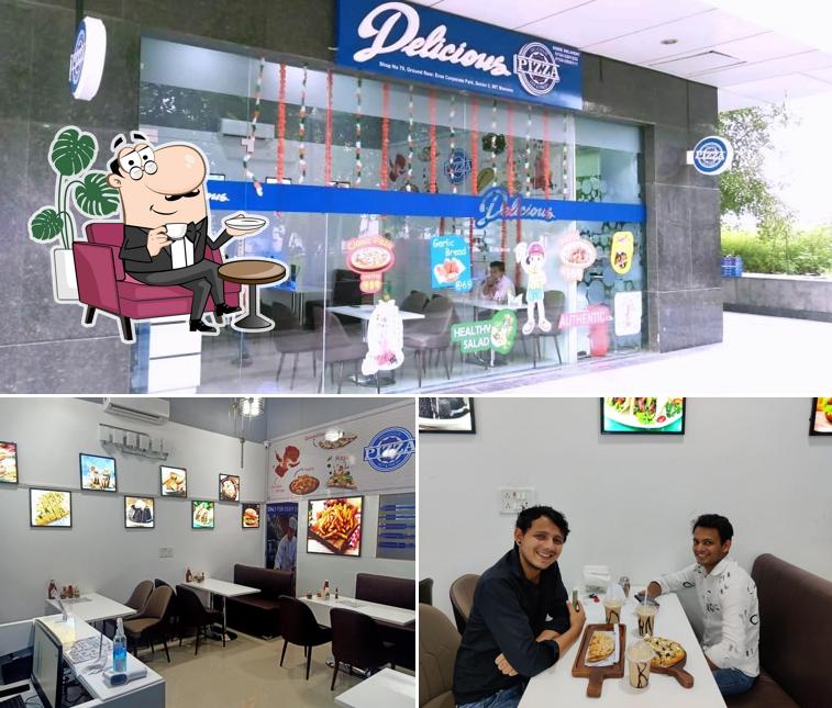 The interior of Delicious Pizza