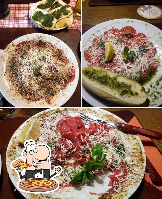 Get pizza at Restaurace Laguna