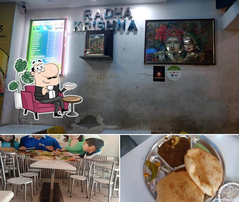 The photo of interior and food at Radha Krishna Chholey Bhature