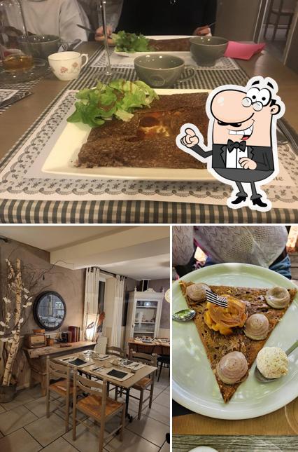 Voici la photo indiquant la intérieur et table à manger sur Crêperie L'Amantine