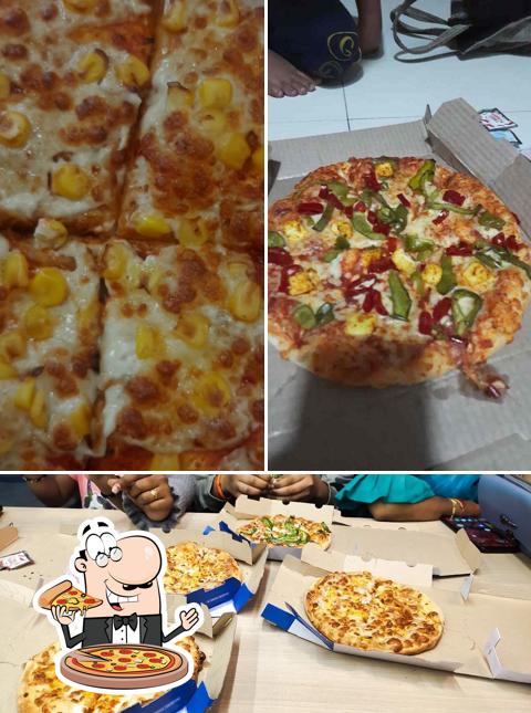 Pick pizza at Domino's Pizza