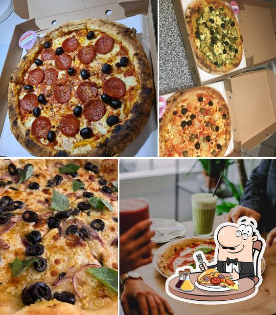 En Green Mosaic Pizza Cafe, puedes disfrutar de una pizza