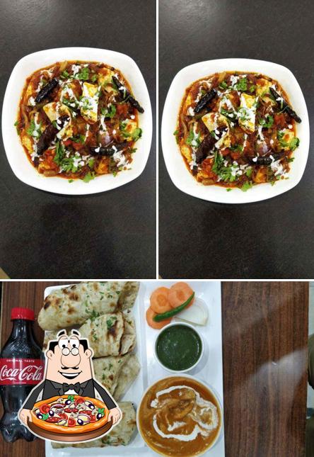 Try out pizza at American Rasoi