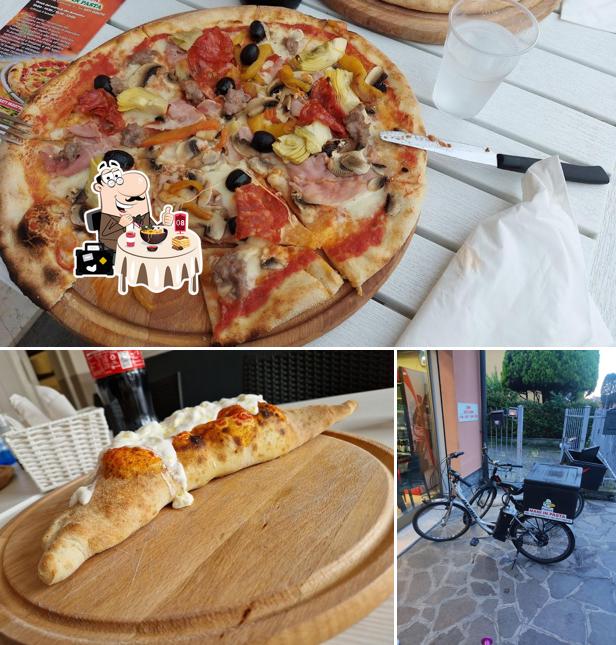 Pizzeria Mani in Pasta si caratterizza per la cibo e esterno