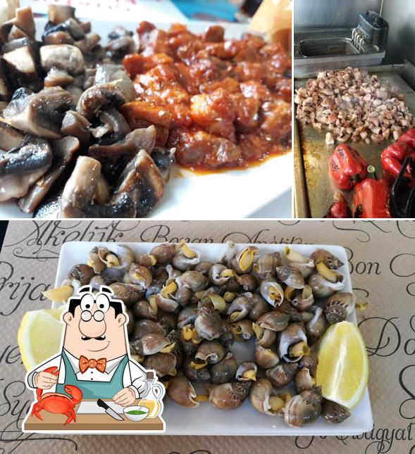 Get seafood at Bar Galícia