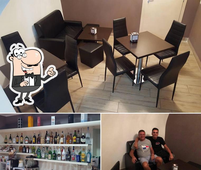 La foto di interni e birra da Q 13 bistrot