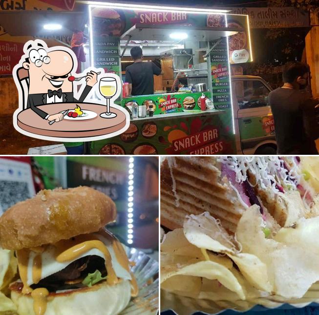 Check out the picture showing food and interior at Snack Bar Express