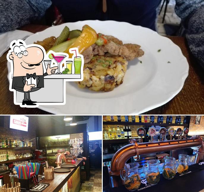 The photo of bar counter and food at Staré dobré Mexiko