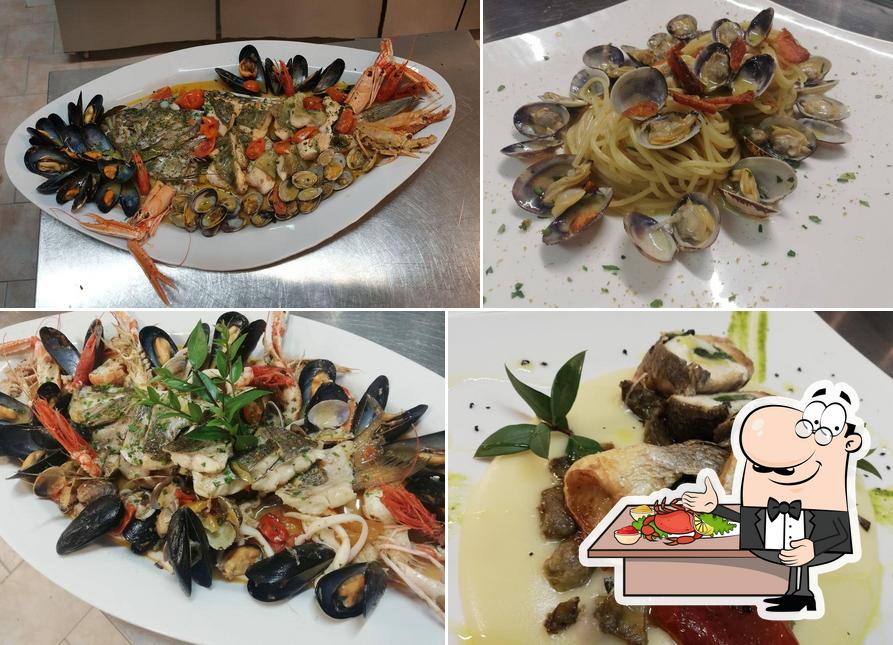 Essayez des fruits de mer à Ristorante Pizzeria Bar Ampurias