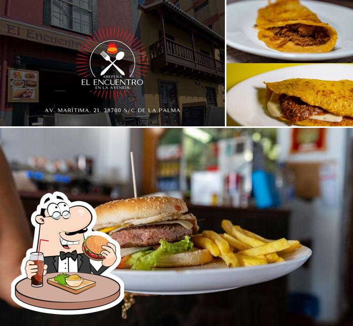 Try out a burger at Bar Arepera El Encuentro