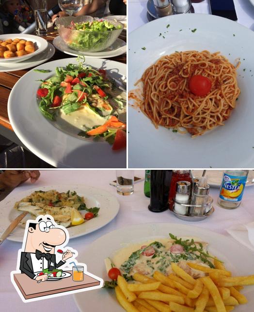 Dai un’occhiata alla immagine che mostra la cibo e interni di La Storia