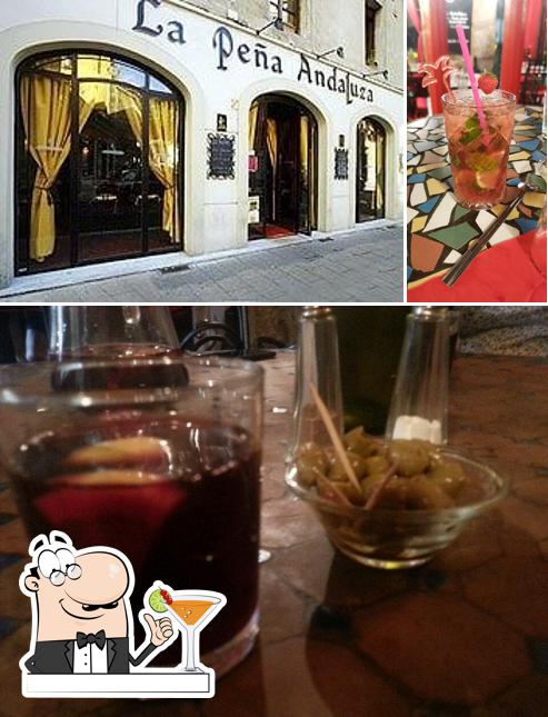 This is the photo displaying drink and exterior at Restaurant La Peña Andaluza
