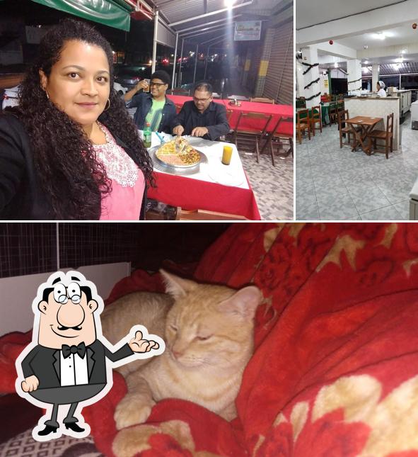 Sente em uma das mesas no Fabiano Pizzas Delivery