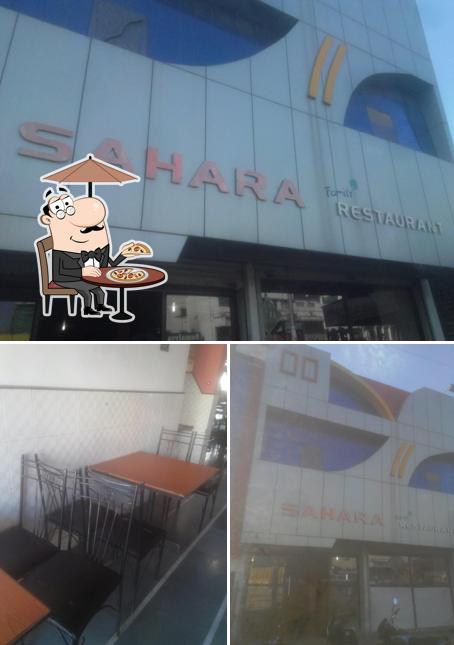 Among different things one can find exterior and interior at Sahara Family Restaurant