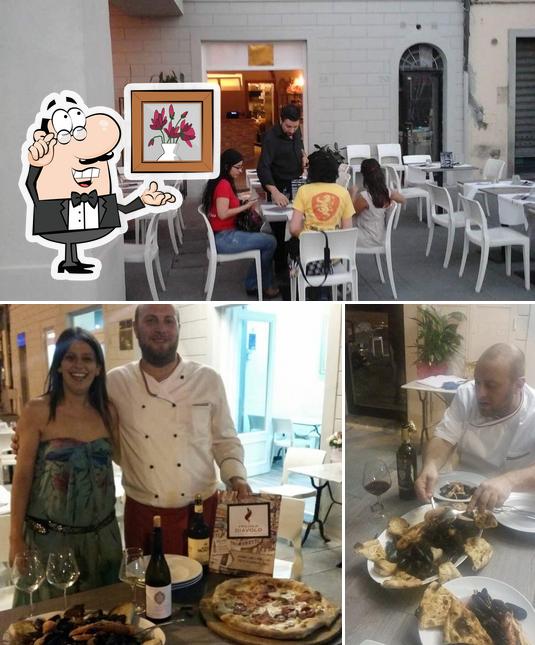 La foto della interni e tavolo da pranzo di Ì piccolo Diavolo