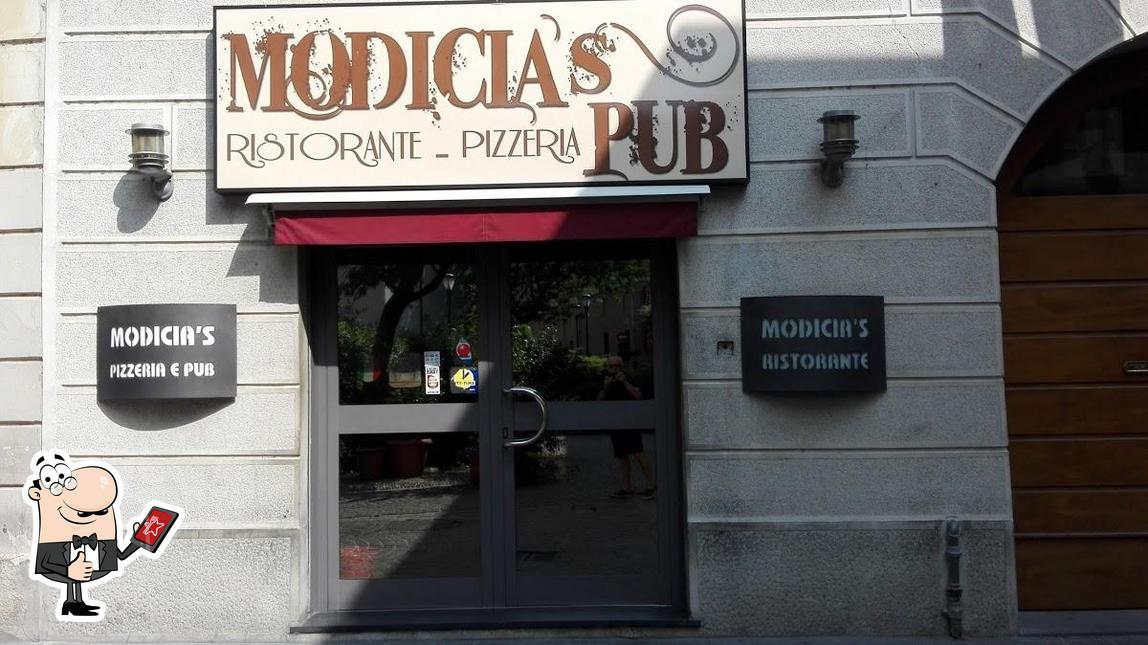 Взгляните на снимок паба и бара "Modicias"